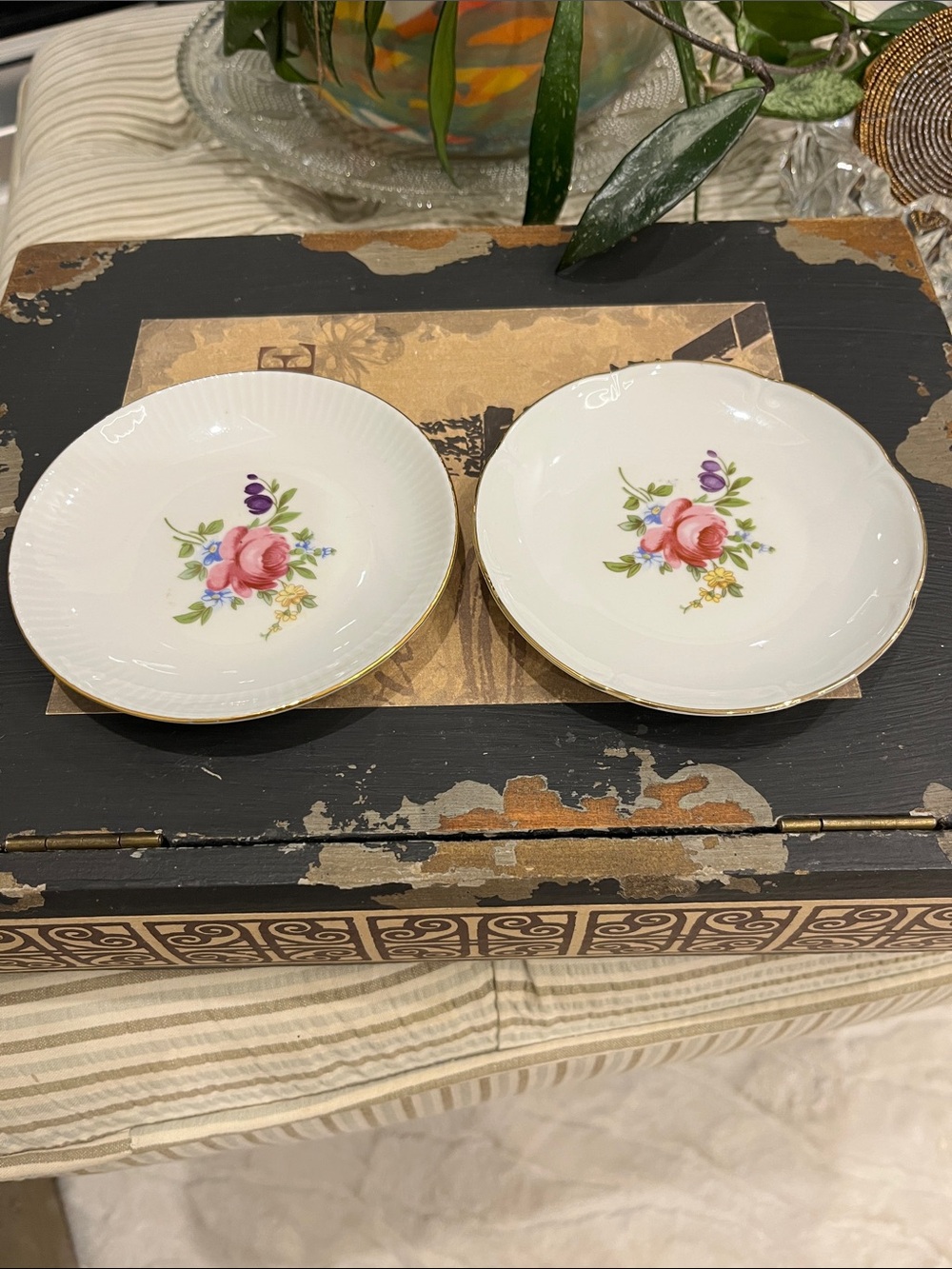 This is a charming set of vintage porcelain saucers from the renowned JLMenau Gr